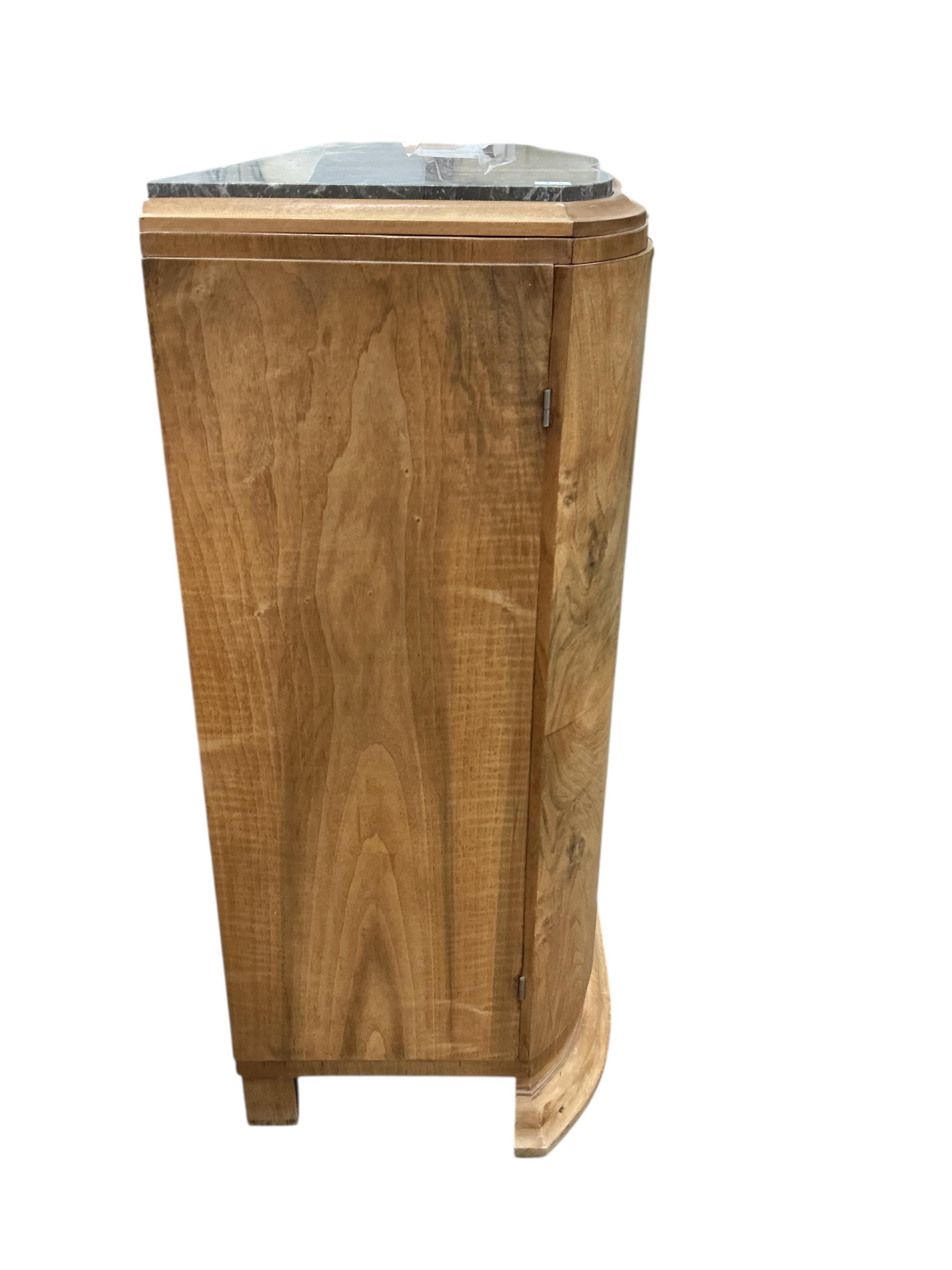 An Art Deco walnut marble topped bow front sideboard, width 158cm, depth 50cm, height 110cm